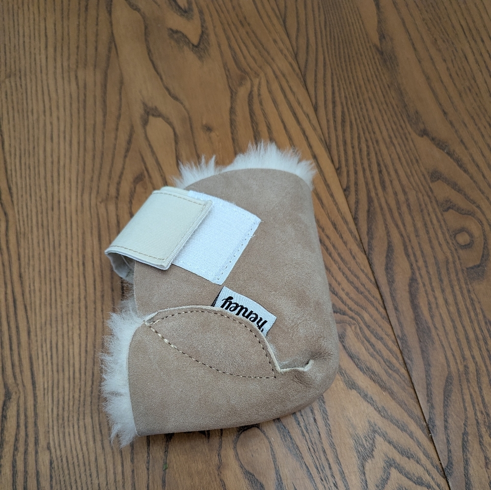 Kenley Heel protector. Sheep Skin Sherpa.  Hook And loop Closure.